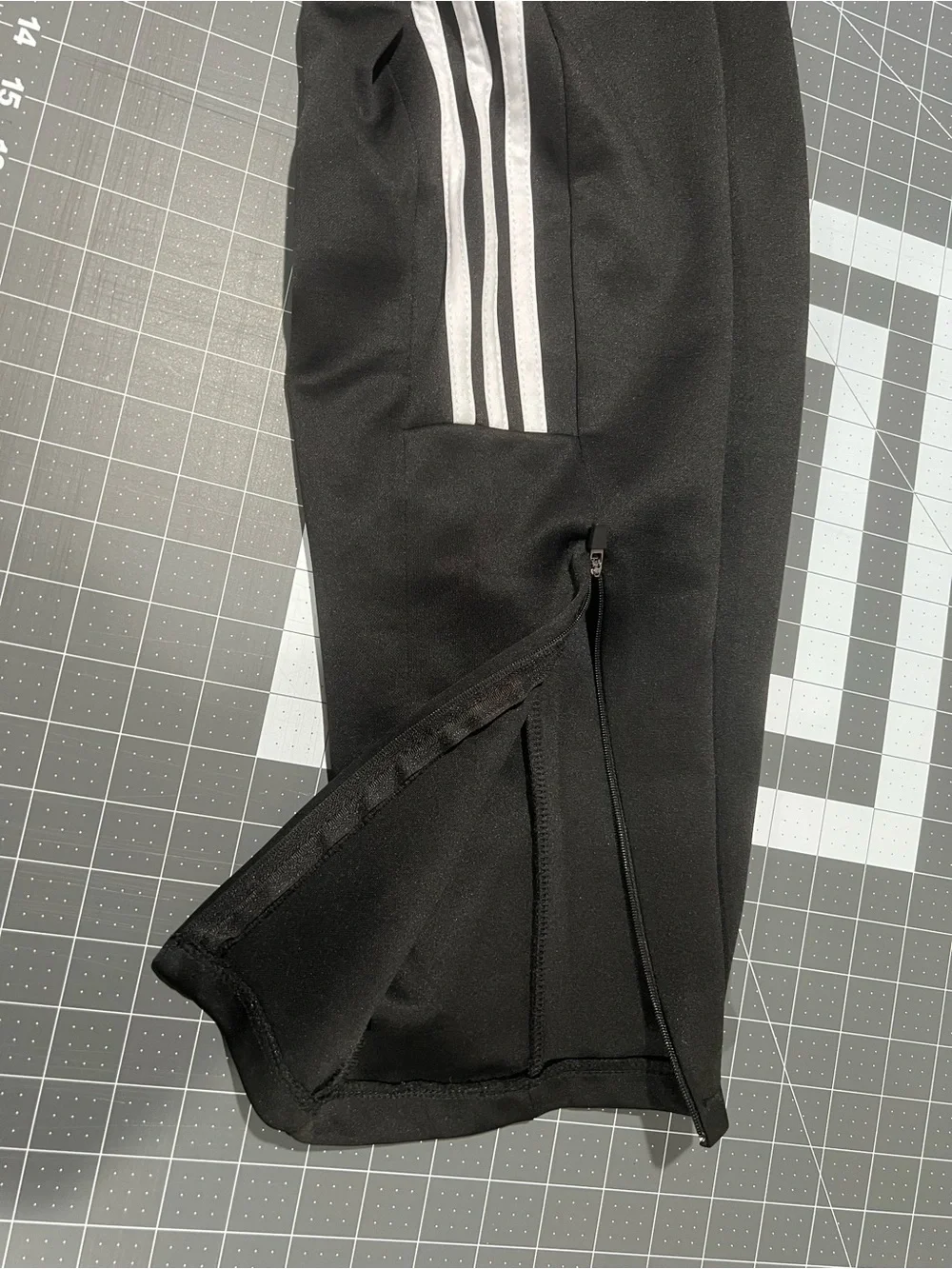 adidas Kids' Black Track Pants with White Stripes, and ankle zippers Size: M